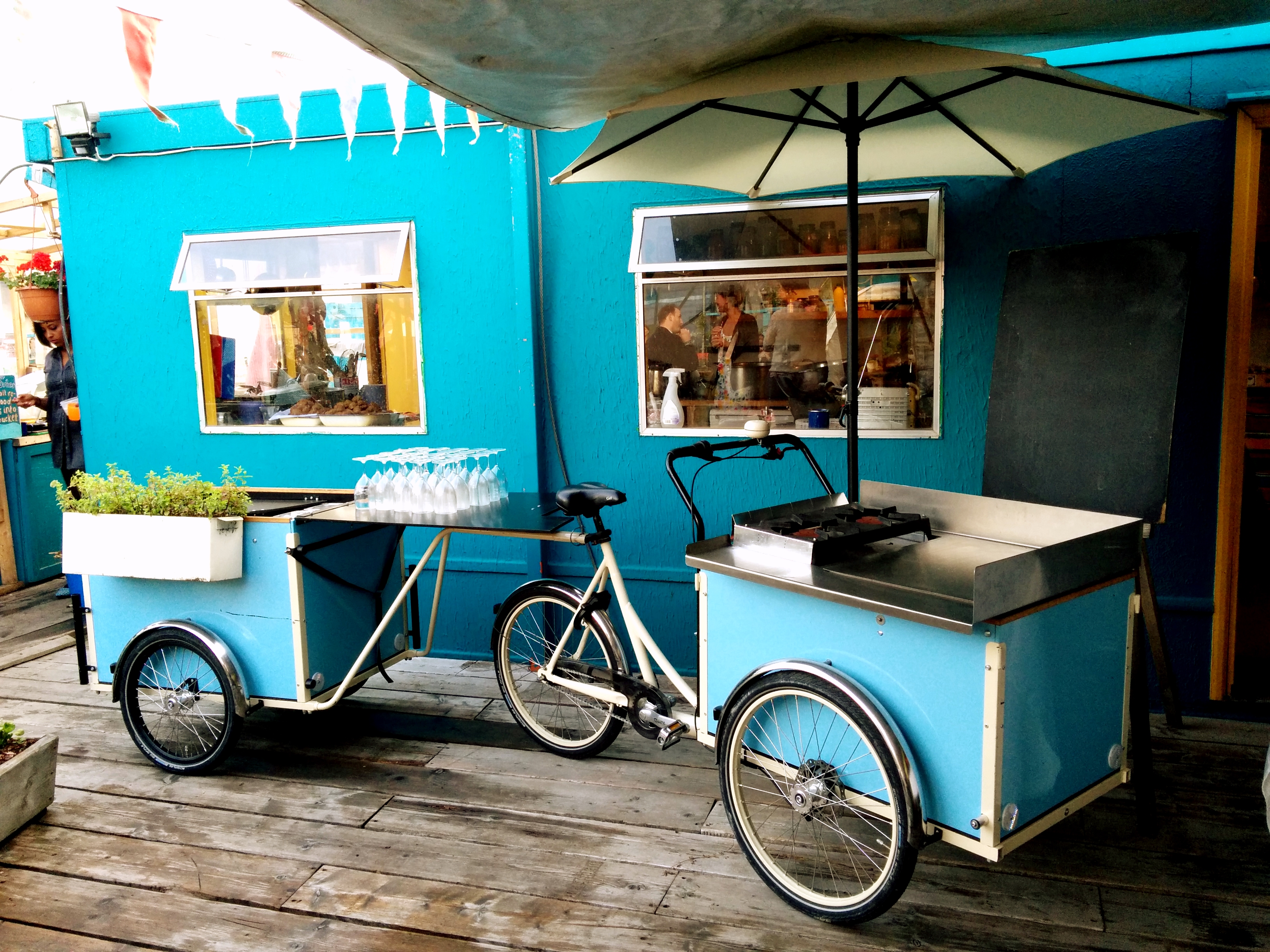 A Christiania cargo bike and its trailer customised for mobile catering