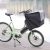A green Bicicapace Classic cargo bike