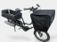 A black Bicicapace Justlong cargo bike