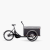 Black Christiania Classic midDrive cargo bike with a raincover