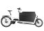 A white Riese and Muller Transporter2 85 vario cargo bike with flat covered box