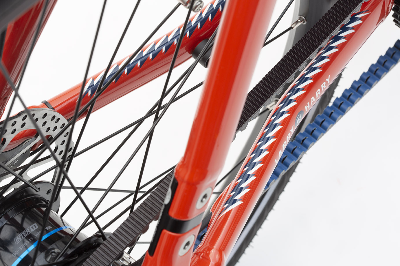 Close up of the belt drive of a Mayor Tom (red) coloured Bullitt cargo bike