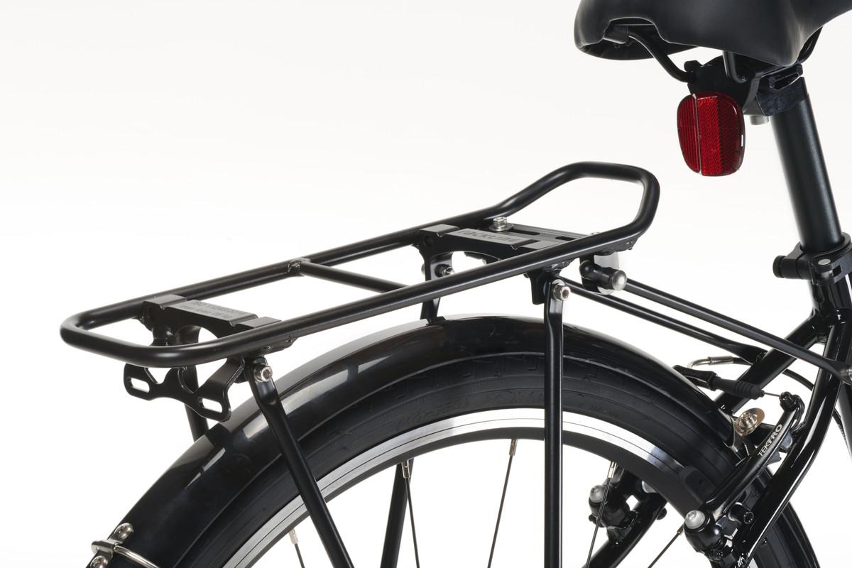 Rear carrier of a black Frog City bike